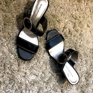 Dana Buckman size 7 1/2 medium, black leather sandal with 3 inch heel.